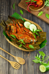 Pepes Ikan Layang or Pais Ikan or Steamed mackerel fish, typically Indonesian traditional food made...