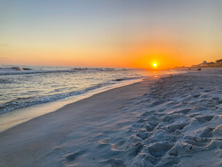 Sunset on the white sands of Navarre Beach, FL