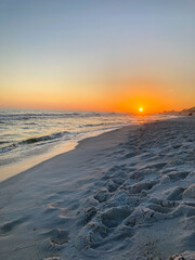 Sunset on the white sands of Navarre Beach, FL