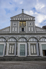 Church St. Minias on the Mountain (San Miniato al Monte) decorated with green and white marble in geometric patterns is oldest church of Florence - XI century. Florence, Tuscany, Italy.