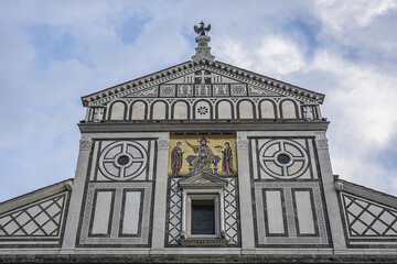 Fototapeta premium Church St. Minias on the Mountain (San Miniato al Monte) decorated with green and white marble in geometric patterns is oldest church of Florence - XI century. Florence, Tuscany, Italy.
