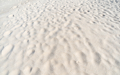 Natural Texture of Sand beach with wave curve of sand on beach in sunny day Image for nature travel background Summer Design concept