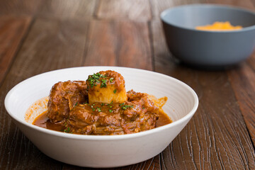 sous vide beef shank with tomato herb sauce and mashed sweet pumpkin