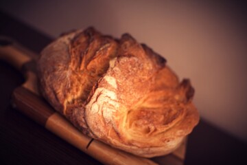 Bread on wooden cutting board