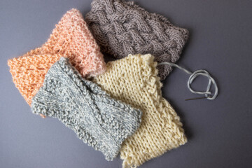 a collection of beautiful hand knit headbands 