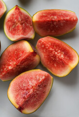 Juicy look sliced ripe figs fruit on white dish
