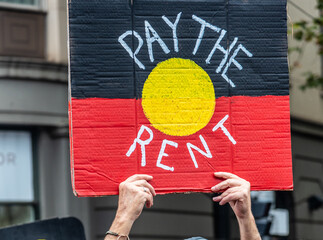 Protest signs at an 'Invasion Day