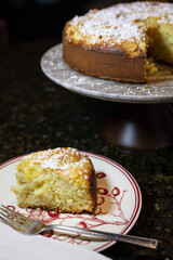 Apple Kefir Cake made with diced apples and kefir topped with powdered sugar