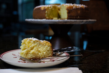 Apple Kefir Cake made with diced apples and kefir topped with powdered sugar
