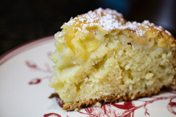 Apple Kefir Cake made with diced apples and kefir topped with powdered sugar