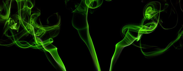 collection swirling movement of green smoke group, abstract line Isolated on black background