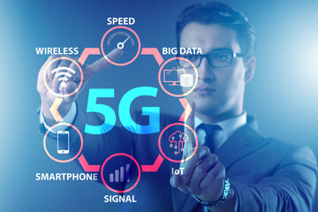 Businessman pressing button in 5g concept