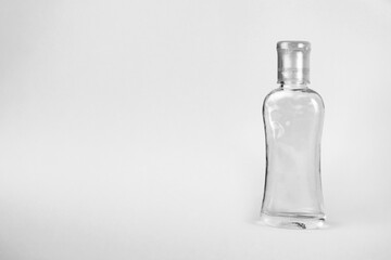 Empty bottle of antibacterial hand sanitizer in white background. Empty flip top bottle, coronavirus hand sanitizer.