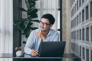 asian man work using computer hand typing laptop keyboard contact us.student study learning education online.adult professional people chatting search at office.concept for technology device business