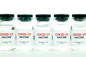 vials of covid-19 vaccine in a row