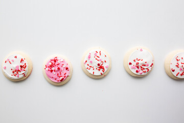 pink and white frosted cookies