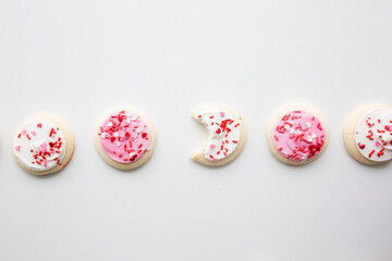 pink and white frosted cookies