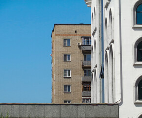 Cityscape. Urban architectural background. Old and new buildings. Blue sky. Ust-Kamenogorsk (kazakhstan)