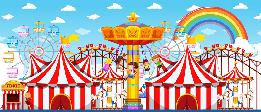 Amusement park scene at daytime with rainbow in the sky