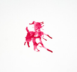 Red watercolor splashes on the white background