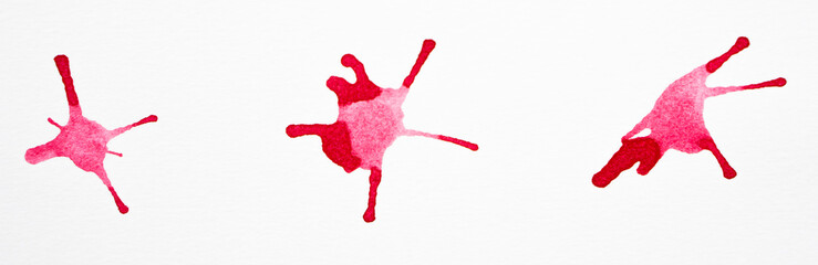 Red watercolor splashes on the white background