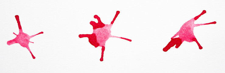 Red watercolor splashes on the white background