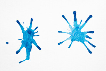 Blue watercolor splashes on the white background