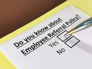 One person is answering question about employee referral policy.