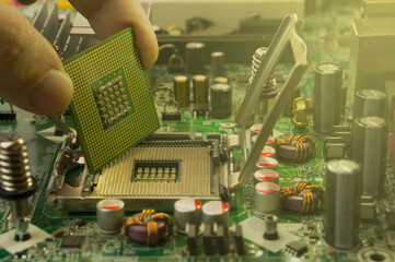 Repair of the motherboard in the service center. Replacing computer parts