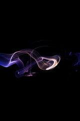 Colorful smoke against black background
