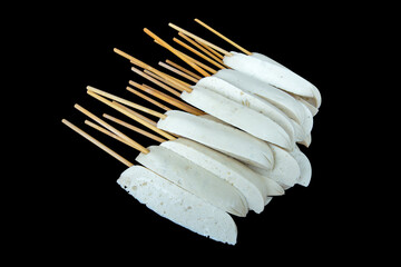 Steamed Vietnamese Pork Sausage with skewers.