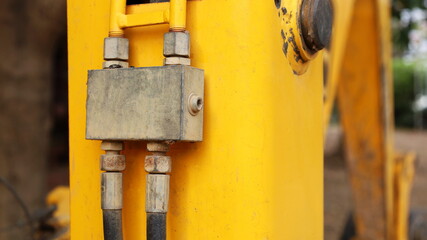 Old hydraulic oil box. Oil flow control valve in hydraulic system to operate the equipment of a...