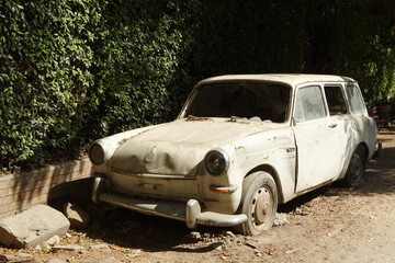Obraz na płótnie Canvas abandoned car at roadside - Cairo, Egypt