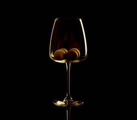 empty wine glass with wooden round decor on black background