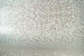glitter vintage lights background. silver and light gold. de-focused
