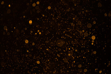 Gold abstract bokeh background. Explosion on black background