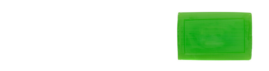 Handmade green soap bar, isolated on white background.