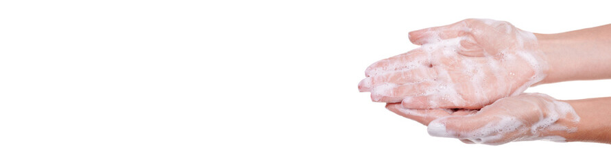 Washing hands with soap, foam on skin, isolated on white background.