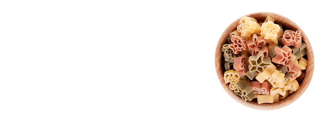 Colored fresh and raw pasta in wooden bowl. Isolated on white background.