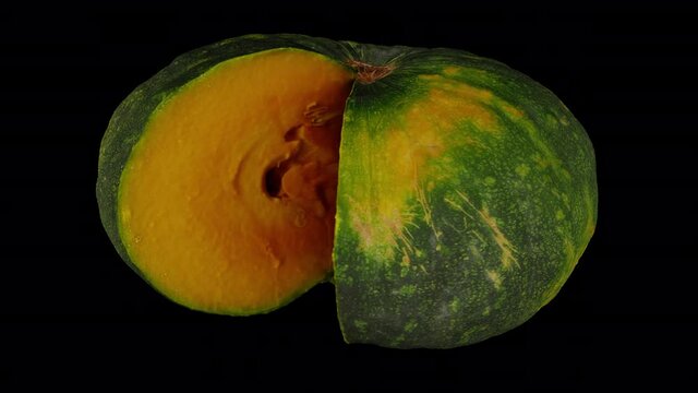 Realistic render of a spinning cut Green Pumpkin on transparent background (with alpha channel). The video is seamlessly looping, and the 3D object is scanned from a real pumpkin.
