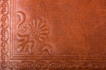 Leather floral pattern deep red color background