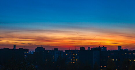 Obraz na płótnie Canvas Sunset over city