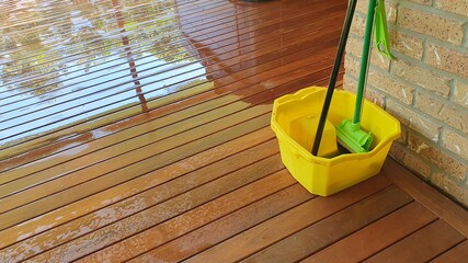 Preparation for oiling Australian Spotted Gum timber deck with merbau tinted oil