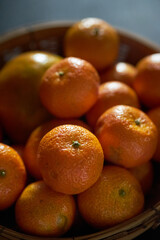 The tangerines in the basket