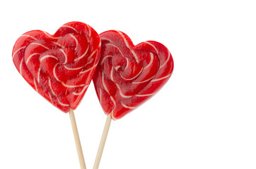 Bright wedding background - couple sweet red lollipops hearts isolated on white backdrop, copy...
