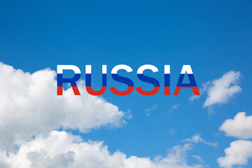 Blue sky with white clouds is with the added inscription Russia.