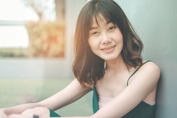 A beautiful Asian short hair girl smailing.