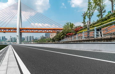 Asphalt ground and urban architectural landscape