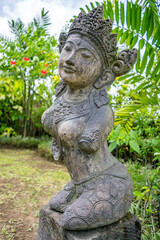 Fototapeta na wymiar Traditional Old Balinese Statue near Ubud, Indonesia [Island of Bali] 
