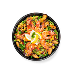 Traditional spanish seafood paella in the fry pan isolated on white background